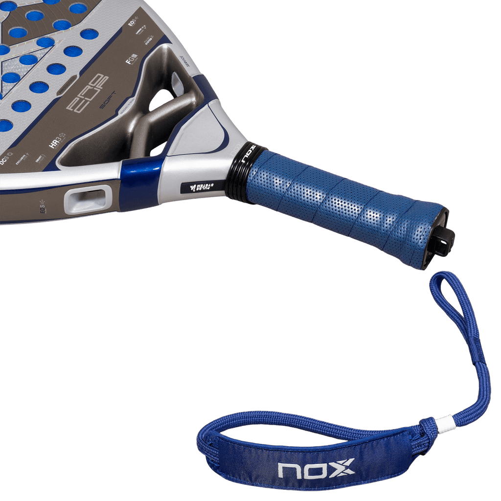 NOX Pro Cup SOFT 2027 padel racket by Agustín Tapia, close-up of the handle and the wrist strap